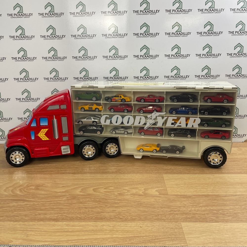 Vintage 1999 Redbox Goodyear Semi Truck Car Carrier with 22 Diecast Cars 69039